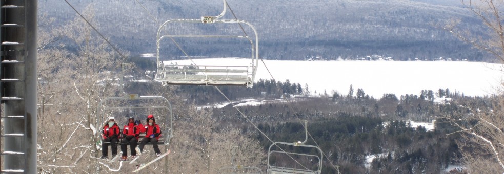 Riding the chairlift at Oak Mountain Ski Center in Speculator